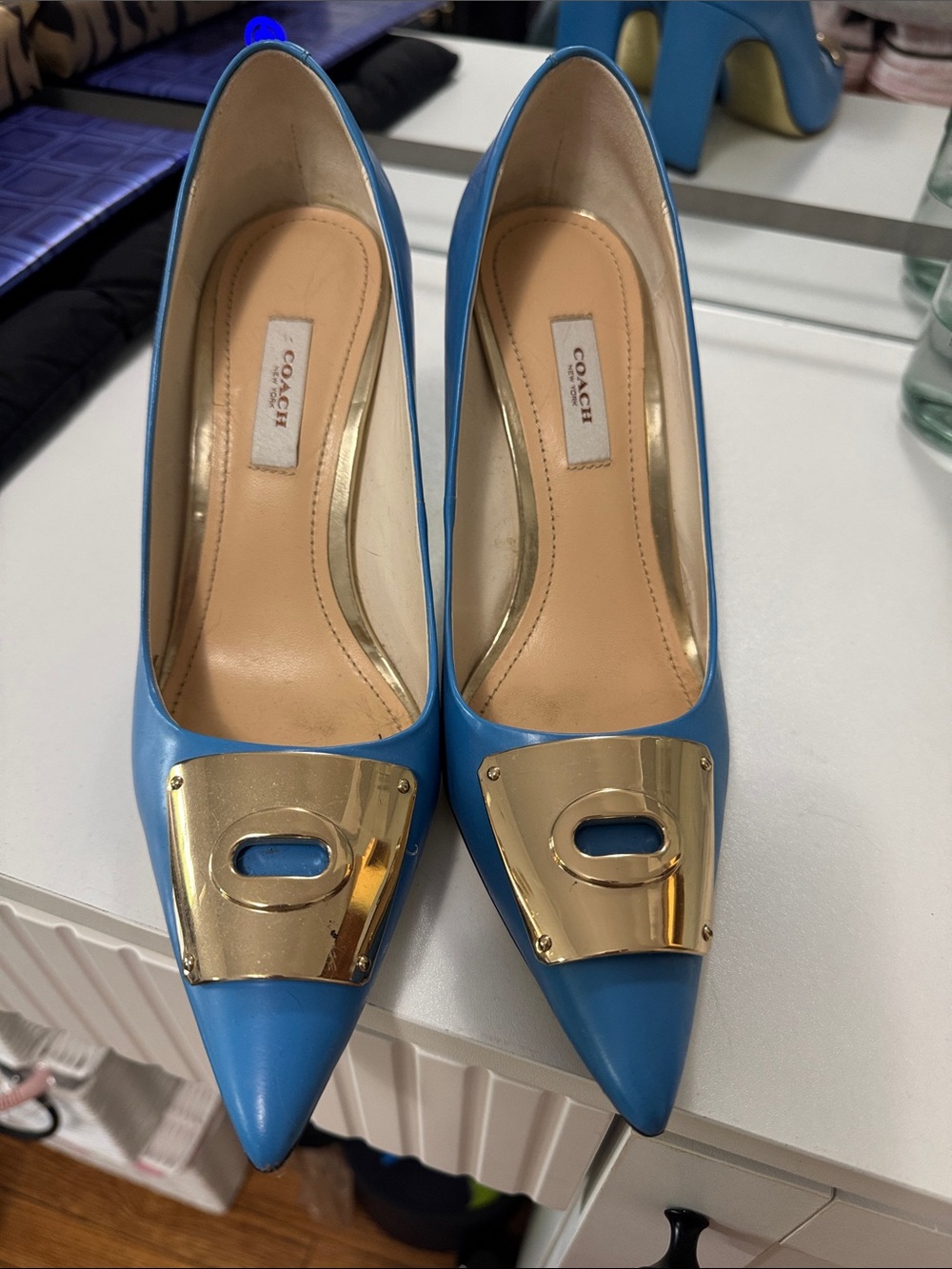 Coach Blue Pointed-Toe Pumps with Gold Plate Accent